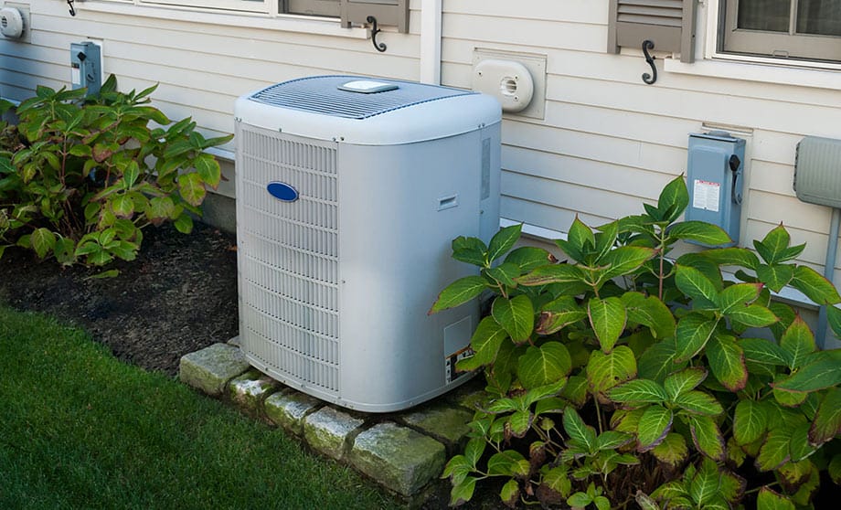 Carrier air conditioner installed outside a Tigard home